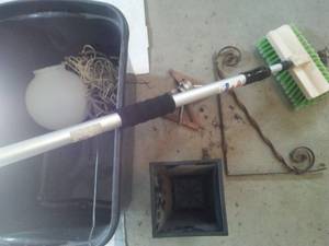 Tote with sprinkler, bed risers - 4 extension cord, car wash brush - nice lot.