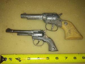 2 toy pistols - Hubley PET & Indian head cap gun