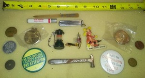 Collectibles tokens, buttons flip knife, toothpick holder & more Swifts Hatchery annual meeting knife.
