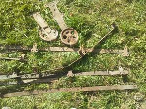 Barn door rail system and 2 door hangers very old