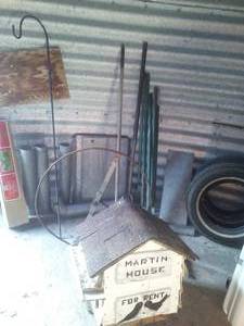 Misc. fence posts, shepherds hook, Martin house, rolling reel and more.