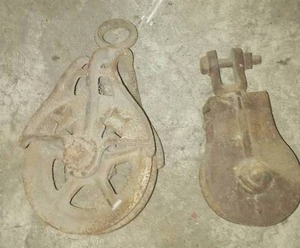 2 Antique pulley wheels - both great.