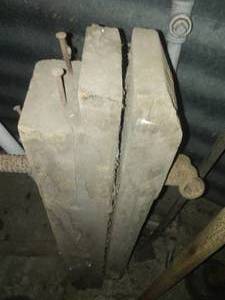 Heavy metal pieces solid. galvanized pipe and watering ends, primitive vise