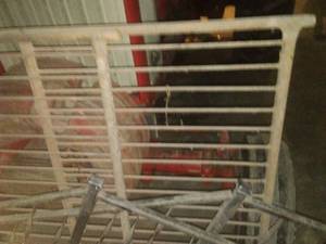 2 cast fence sections & 2 metal stairway railings. Loc Machine Shed Back Wall