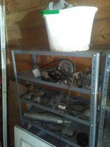lot 52 image: Misc. Automotive and Motorcycle Parts with Shelf.