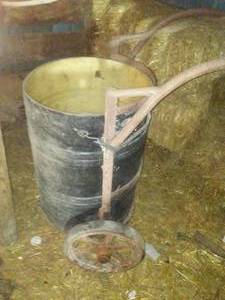 lot 91 image: Vintage 50 Gallon Drum Cart and drum