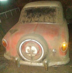 lot 7 image: 1957 Metropolitan. Red and white. Decent condition.