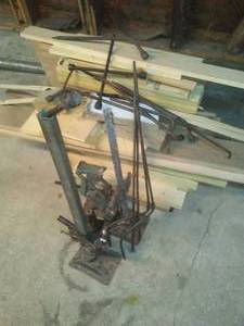 lot 108 image: Vintage Tire Jacks and Wood Remnants.
