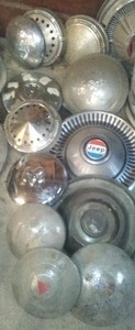 lot 121 image: Jeep, VW, Studebaker Hubcaps, variety