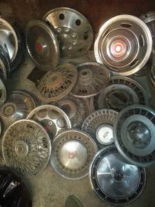 lot 122 image: Plethora of Misc. Hubcaps