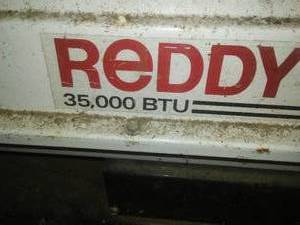 lot 133 image: 35,000 BTU Kerosine Heater, Reddy Heater, electric blower.