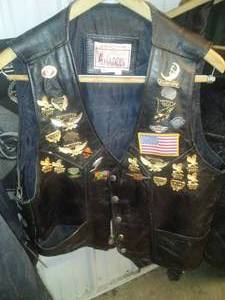 lot 188 image: Addis Leather Vest with Sturgis Pins and more. XXL