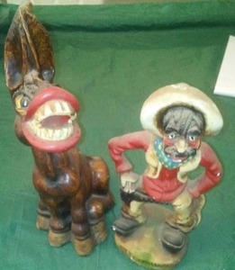 lot 160 image: Donkey and Cowboy Figurine