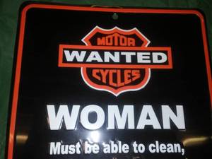 lot 247 image: Wanted Motorcycle Woman Metal Sign