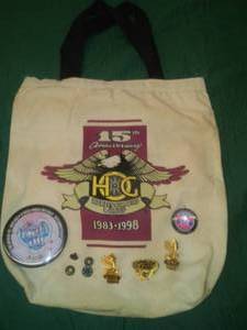 lot 254 image: Sturgis Bag, pins and 50th Anniversary pin.