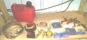 lot 276 image: Misc. Tape Measures, L Brackets, hooks, SS Clamps and more.
