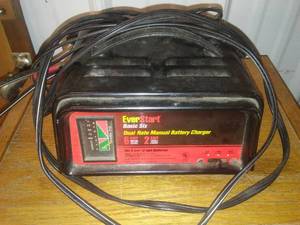 lot 295 image: Battery Charger 12v and 6v. Like New, 6 amp and 2 amp trickle with meter.