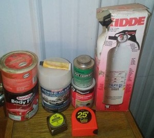 lot 303 image: Fire Extinguisher, Bondo and more.