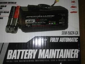 lot 308 image: 5 Speed Chargers, Motorcycle Schumacher Electric - Like New.