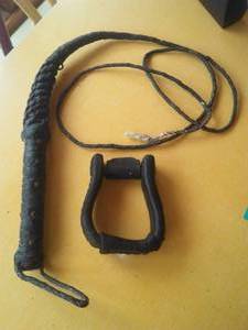 lot 394 image: 7 ft. Whip and Stirrup well made.