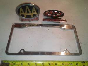 lot 409 image: AAA Chrome Awards and License Plate Holder.