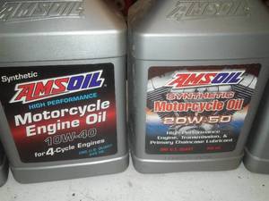 lot 427 image: Amsoil Motorcycle Oil (5) and more. Quart Size.