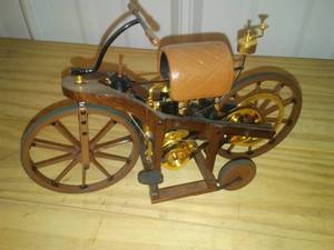 lot 469 image: Wood Motorcycle, Replica, Wheels and gears turn.