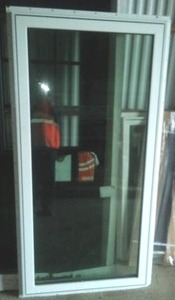 lot 284 image: Picture Window  with nailing flange fin installed momentarily Thermo - tech vinyl