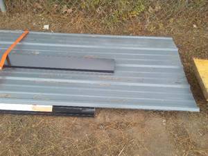 lot 370 image: Pewter gray, Steel Siding, plus corner and box of F Channel, 4 sheets, F Channel fascia (5)