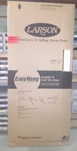 lot 413 image: 36 in. Larson Storm Door Classic Elegance, Full view - new in box.