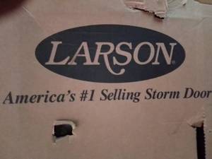 lot 418 image: Larson Storm Door lifetime Core 36 in. New in box