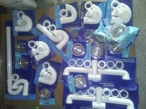 lot 100 image: Drain Traps, Dual Sink, Strainer Baskets and more