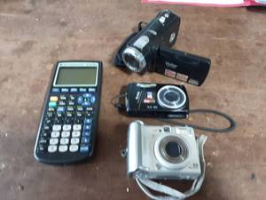 lot 37 image: Texas Instruments Graphing Calculator, (TI 84), 3-Digital Cameras