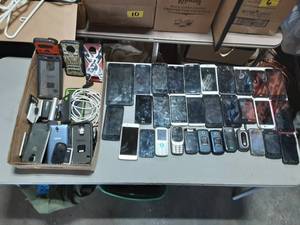 lot 38 image: 32 Cell Phones (Some Work Or Good For Scrap Gold)