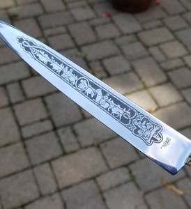 lot 83 image: INOX. Gaucha Parrying Dagger with Sheath
