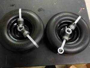 lot 236 image: Flat Free 11 x 4 Tires for Zero Tur...