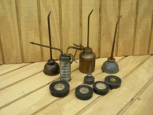 lot 63 image: Oil Cans and Electrical Tape