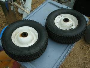 lot 39 image: Pair Hard Rubber Utility Wheels