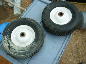 lot 38 image: Pair Hard Rubber Utility Wheels