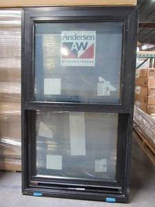 lot 610 image: Andersen Series 100 Single Hung Vinyl Window in Black. Measures Approximately 28 x 47 58 x 2