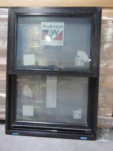 lot 612 image: Andersen Series 100 Single Hung Vinyl Window in Black. Measures Approximately 34 x 47 58 x 2