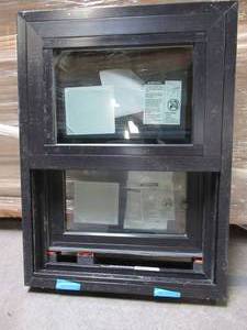 lot 615 image: Andersen Series 100 Single Hung Vinyl Window in Black. Measures Approximately 17 12 x 23 12 x 2