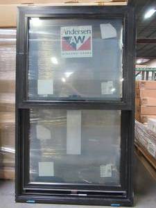 lot 602 image: Andersen Series 100 Single Hung Vinyl Window in Black. Measures Approximately 32 x 53 18 x 2.