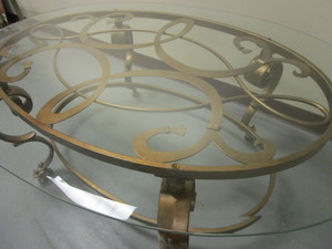 lot 108 image: COFFEE TABLE, WITH DECORATIVE METAL BASE AND GLASS TOP