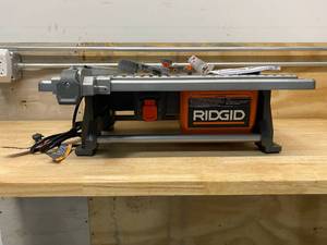 lot 44 image: RIGID 6.5 Amp Corded 7 in. Table Top Wet Tile Saw