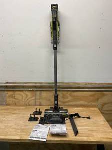 lot 49 image: RYOBI 18-Volt ONE Brushless Stick Vacuum Kit with 4.0 Ah Lithium-Ion High Capacity Battery and EVERCHARGE Rapid Charger
