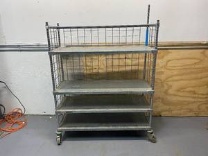 lot 101 image: Four Tier Shelving Unit on Casters