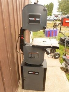 lot 1 image: Porter Cable bandsaw. Nearly new. Has minor scratches. No blade or miter included. As shown.