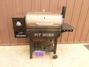 lot 16 image: Pit Boss pellet grill for parts or repair. Is missing some pieces. As shown.