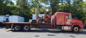 1998 International 9200 22 Foot Flatbed Semi Stretch 51,000 GVW Truck With Moffett M5000 Forklift